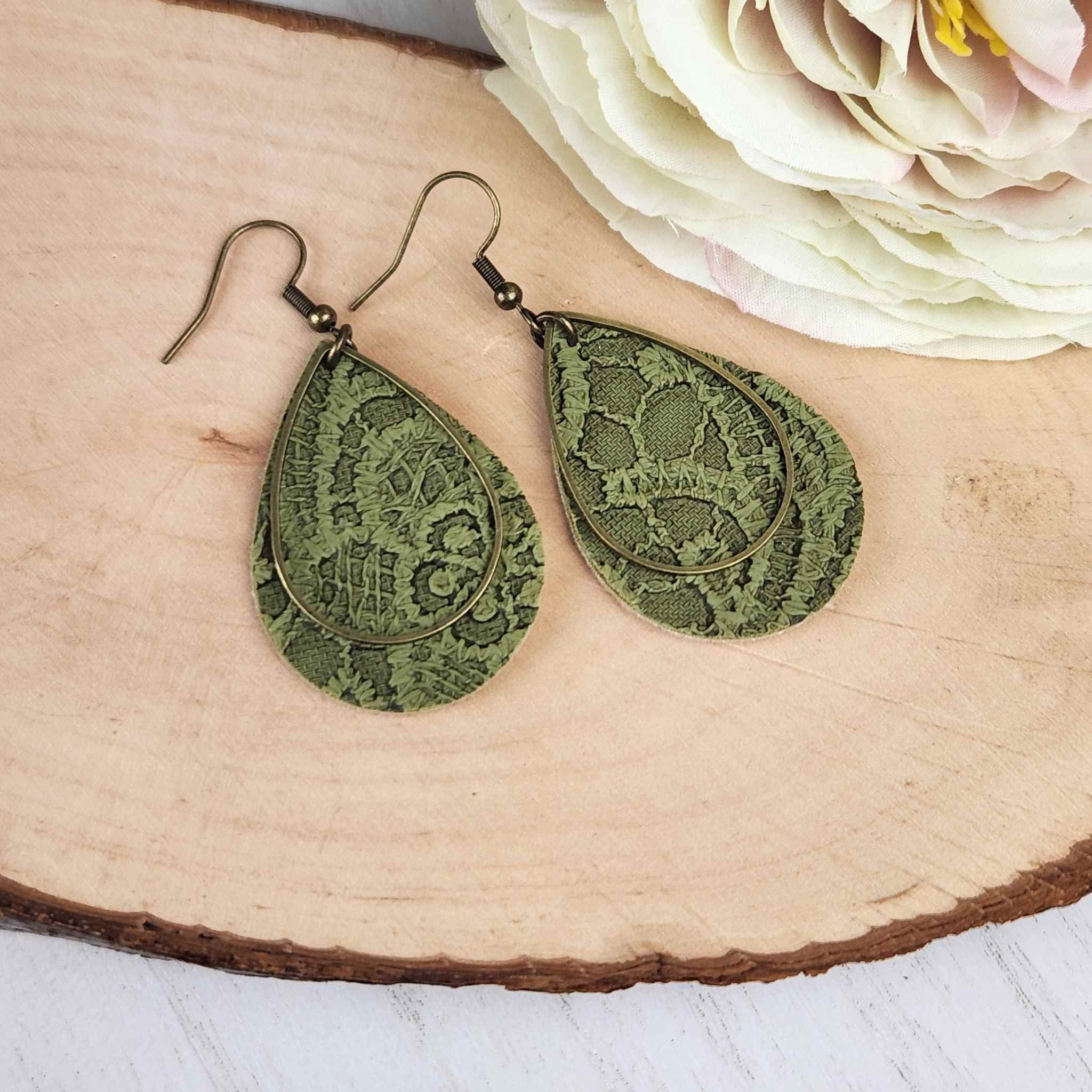 Green teardrop earrings made with hypoallergenic hooks