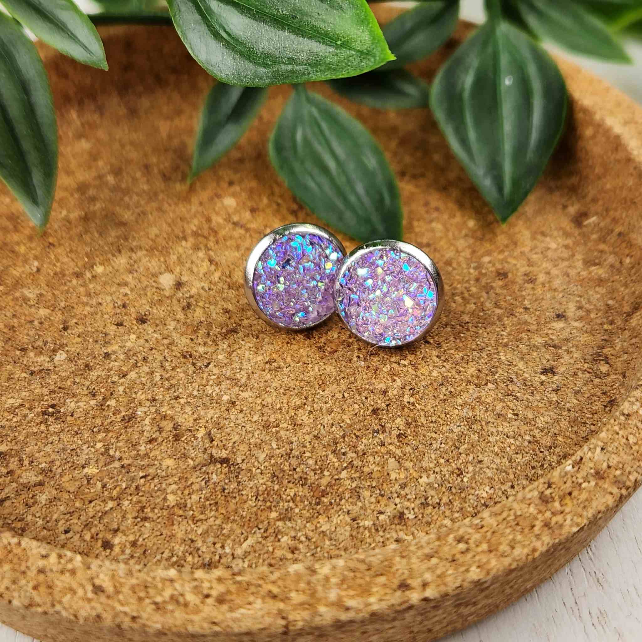 Beautiful purple shimmering crystal cluster studs. Studs are hypoallergenic and are 10mm in diameter.