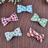 Five different argyle bowties with stetch band and clasp for attaching around your neck.