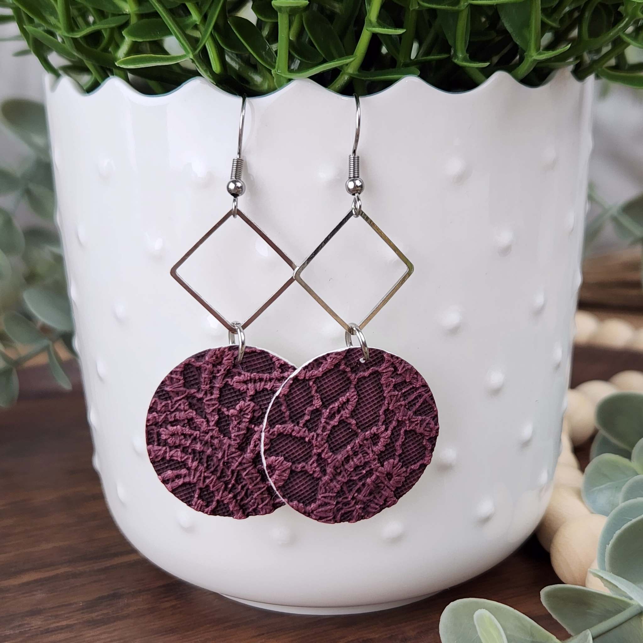 Burgundy dangles with hypoallergenic hooks.