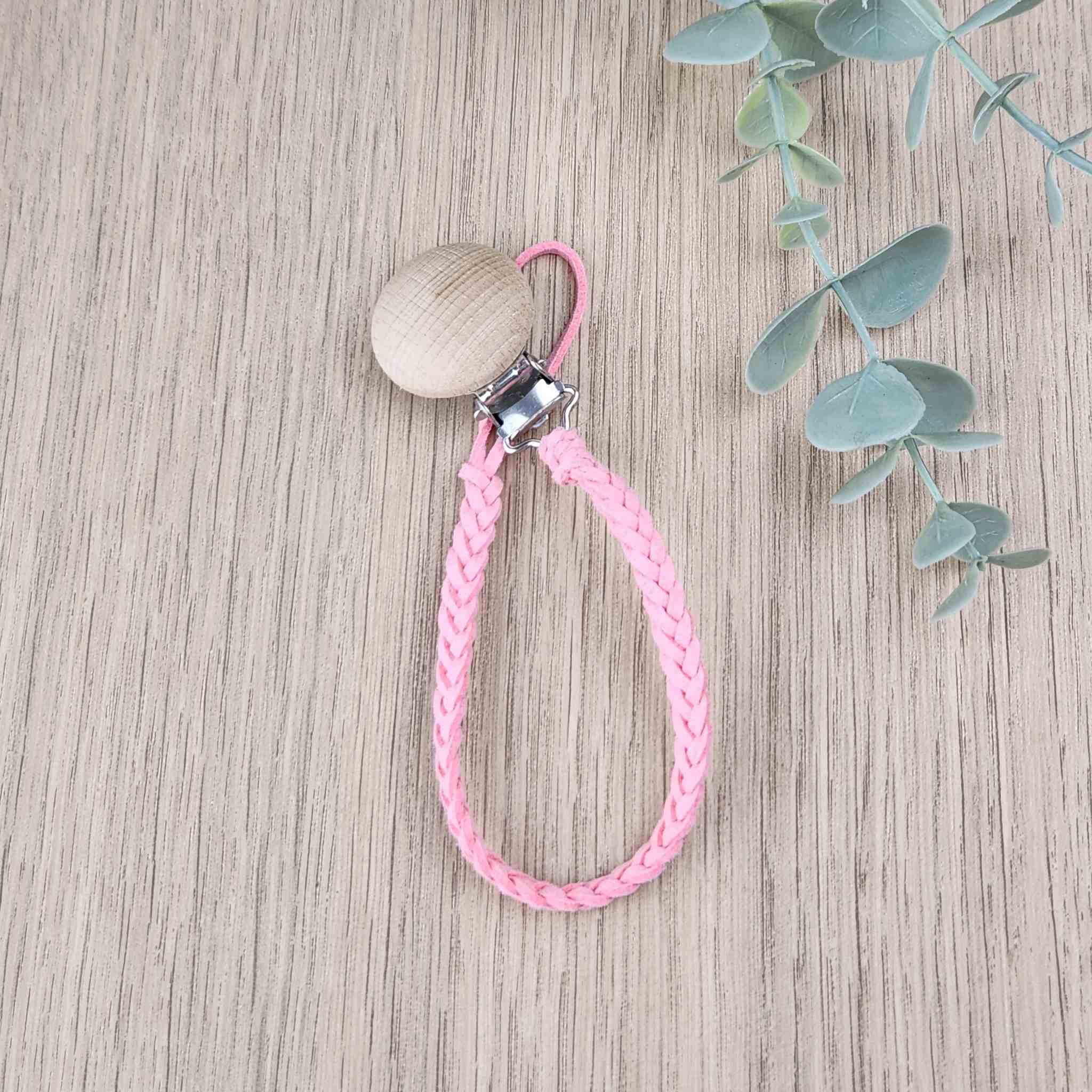 Light Pink soother clip with leather braided cord and a wooden clip