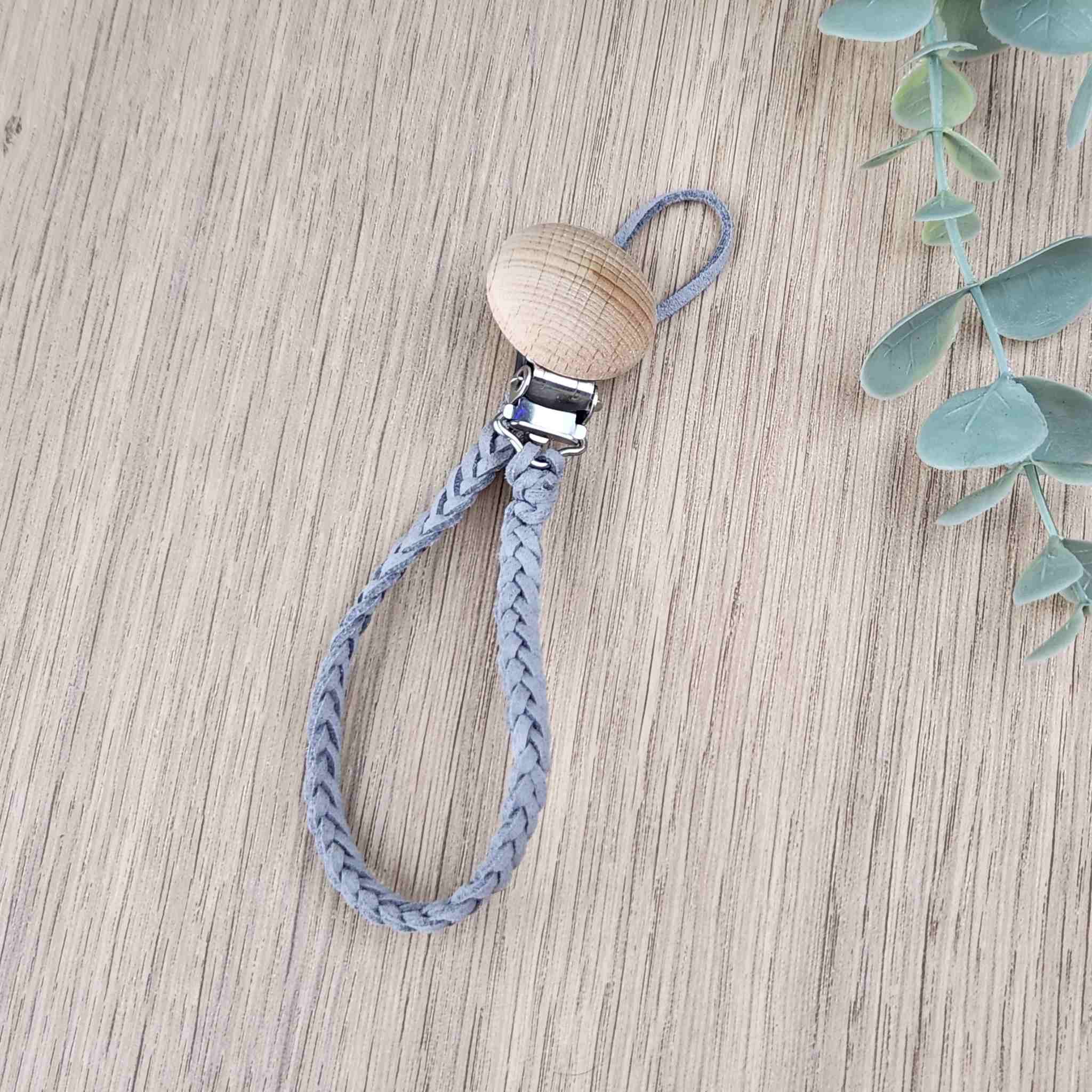 Light Grey soother clip with leather braided cord and a wooden clip