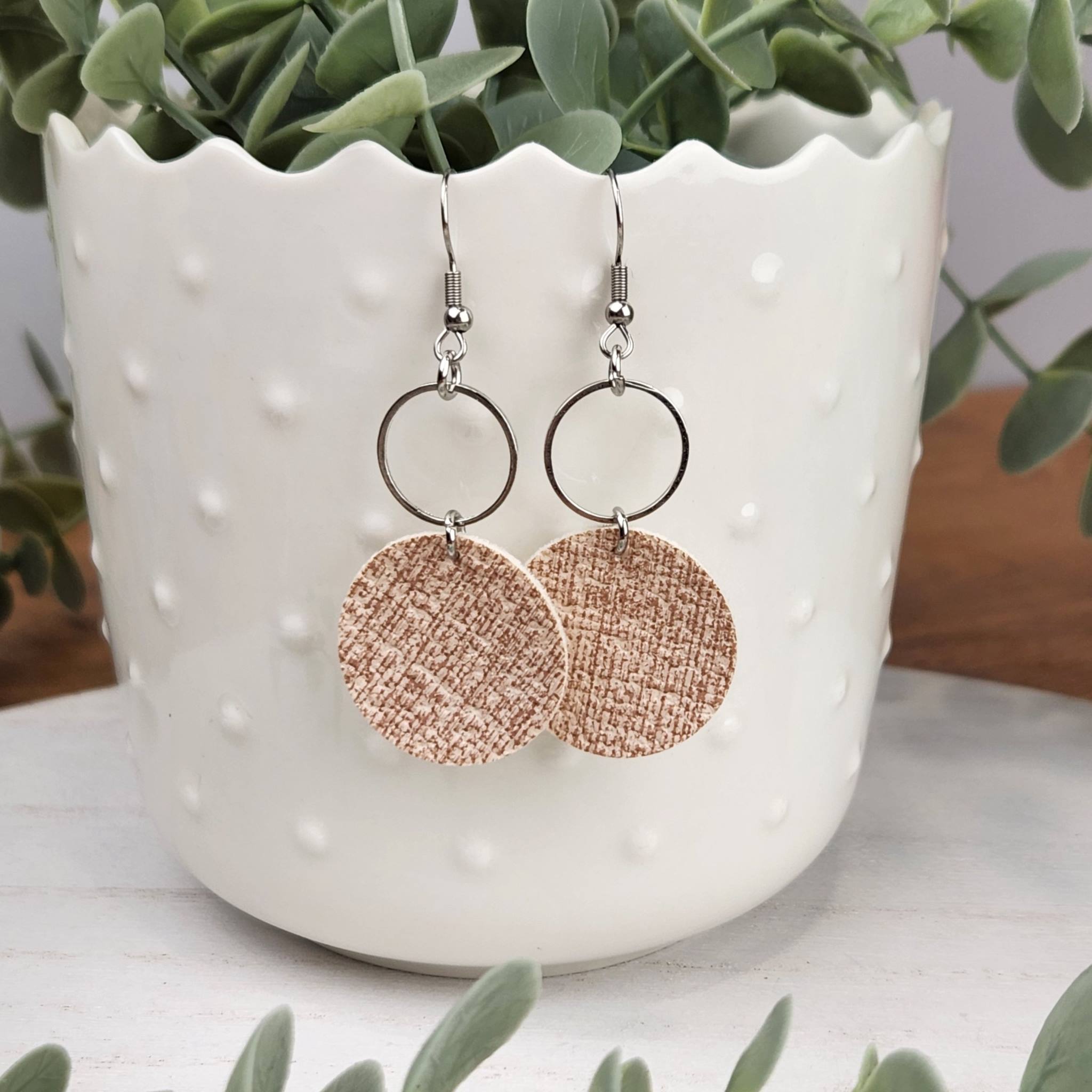 Sandy colored circle earrings made with hypoallergenic hooks