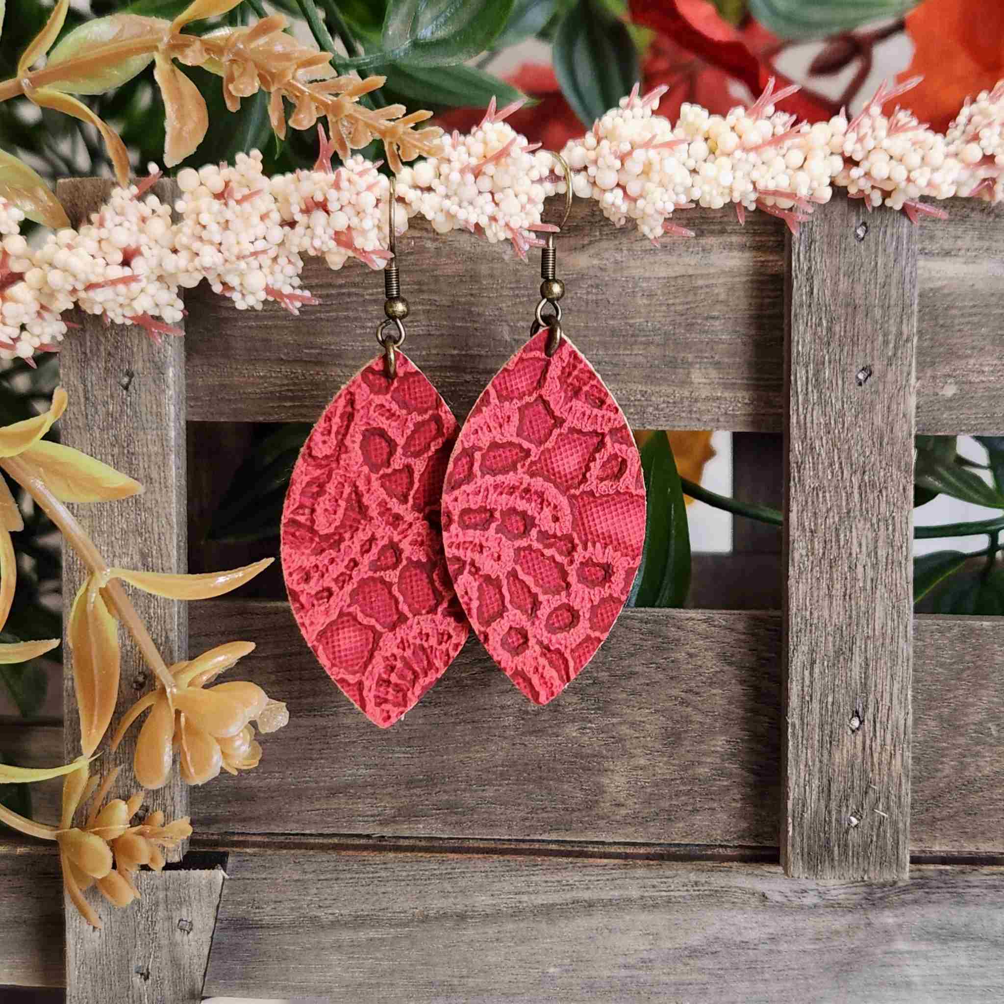 Earrings made with red embossed leather and hypoallergenic earrings