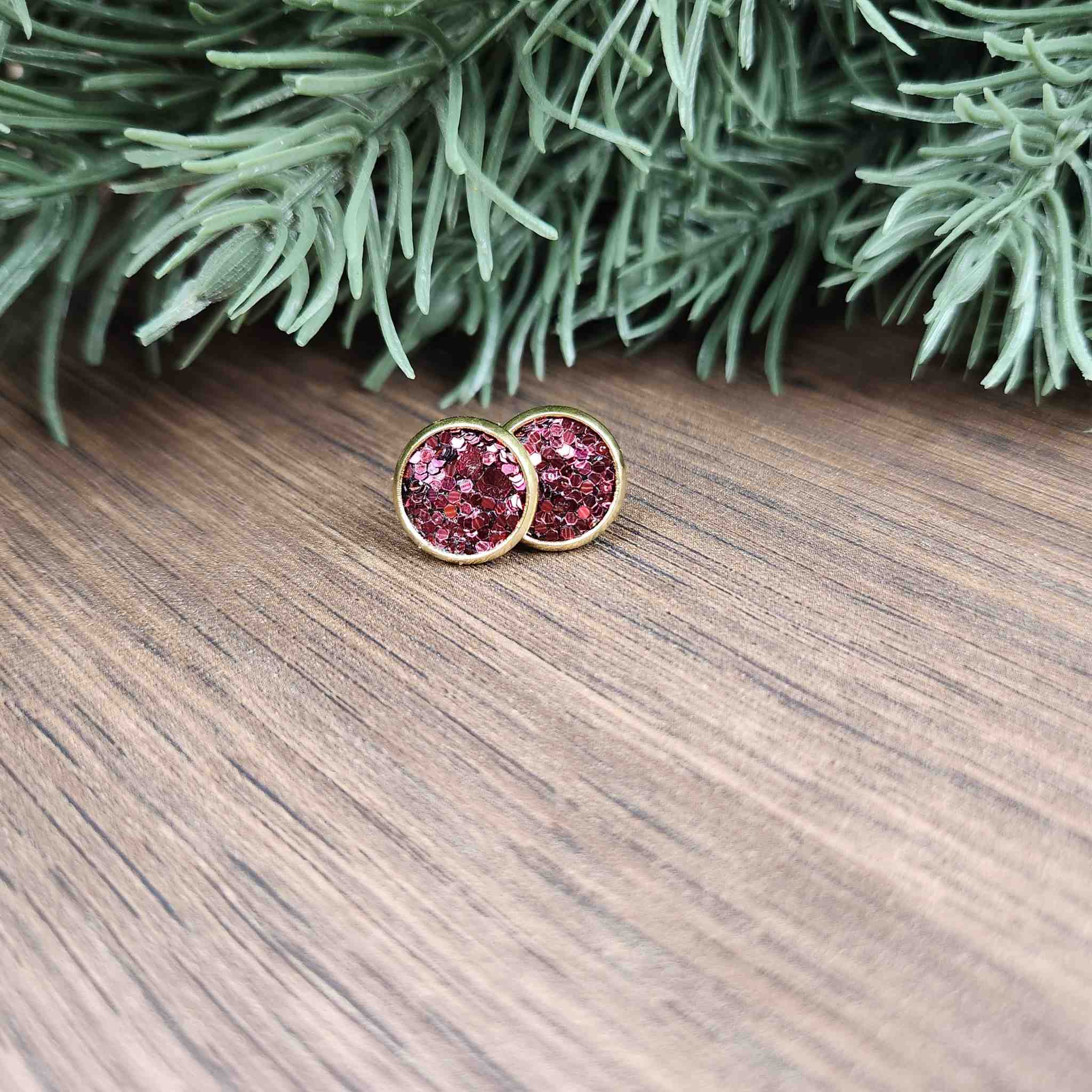 Chunky glitter deep red studs. Made with hypoallergenic posts.