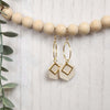 Cream colored elegant hexagon dangle earrings. Made with hypoallergenic hooks.