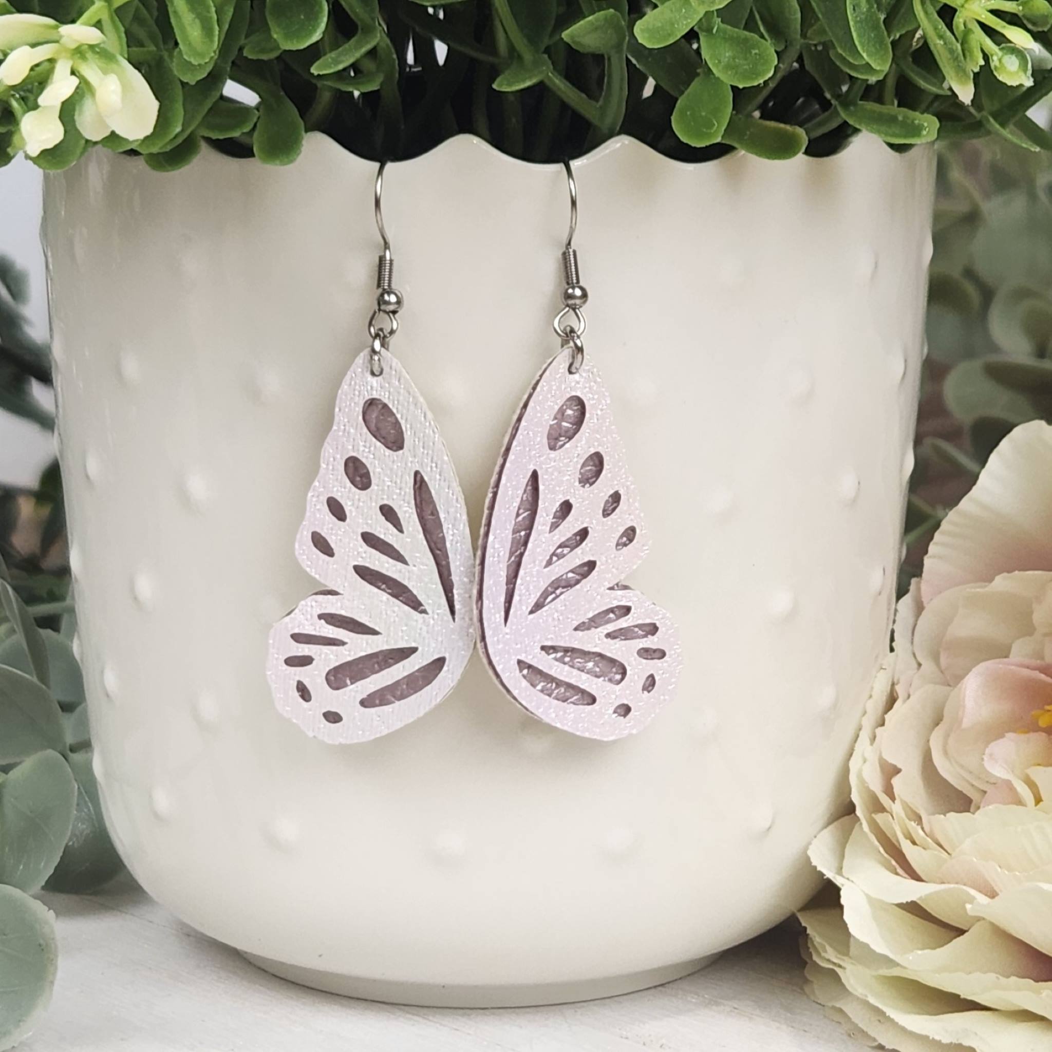 <p data-mcIridescent shimmery butterfly wing earrings. Hypoallergenic hooks.