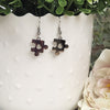 Cute silver puzzle piece earrings. Made with Hypoallergenic hooks.