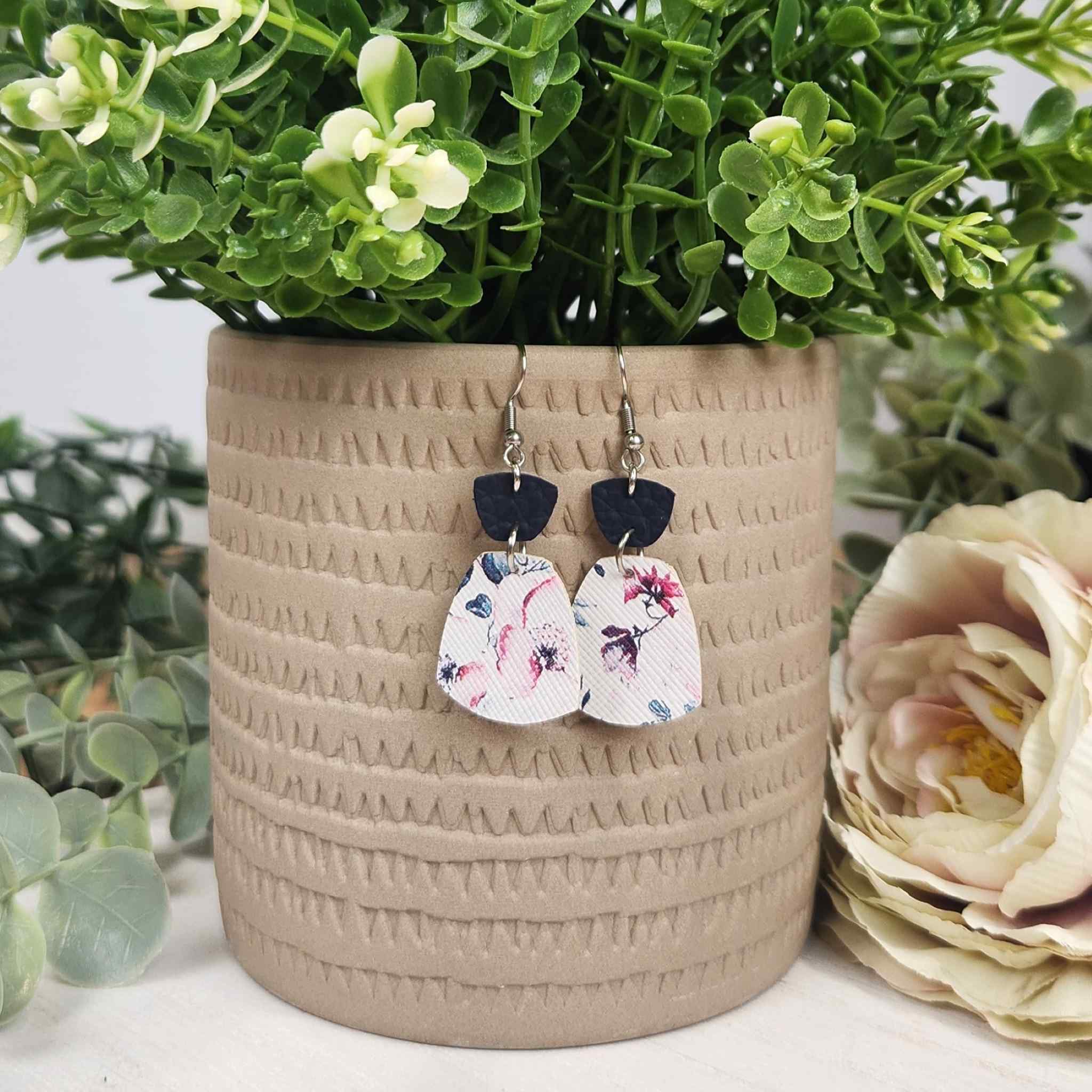 Pink and navy blue floral with a navy blue connector. Made with Hypoallergenic hooks.