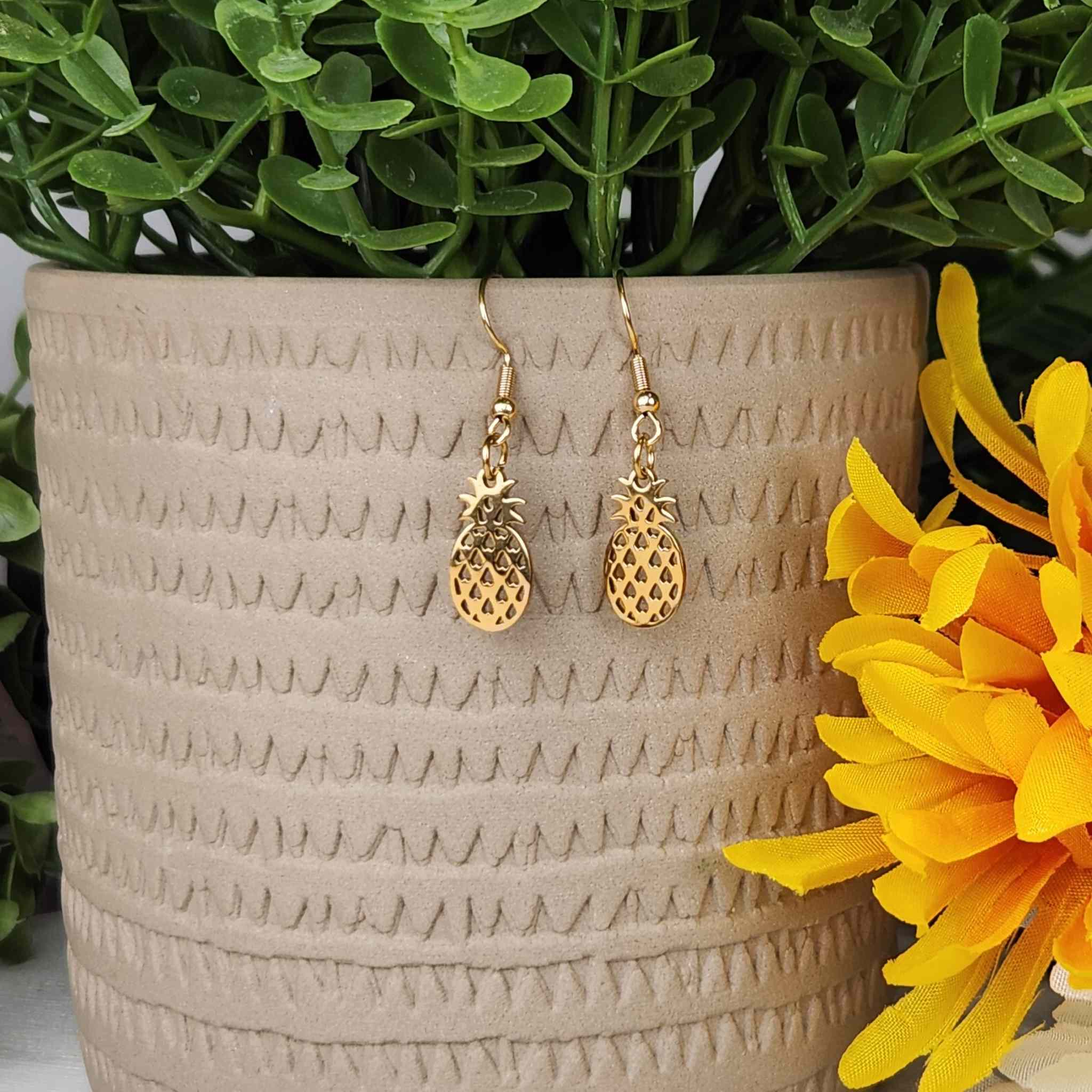 Gold pineapple earrings.  Made with hypoallergenic hooks.